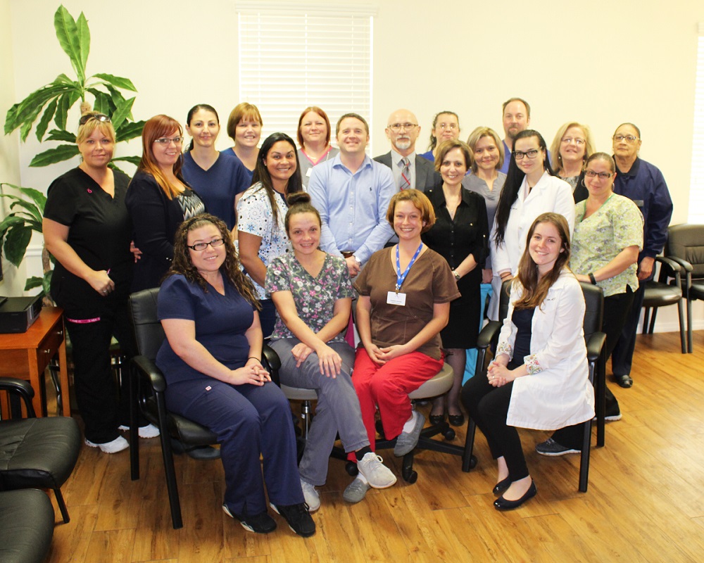 Dr. Herndon & Dr. Stoyanov with their office staff